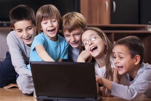 Description: Macintosh HD:Users:blairrobinson:Downloads:Friends having fun with lap top PC.jpg